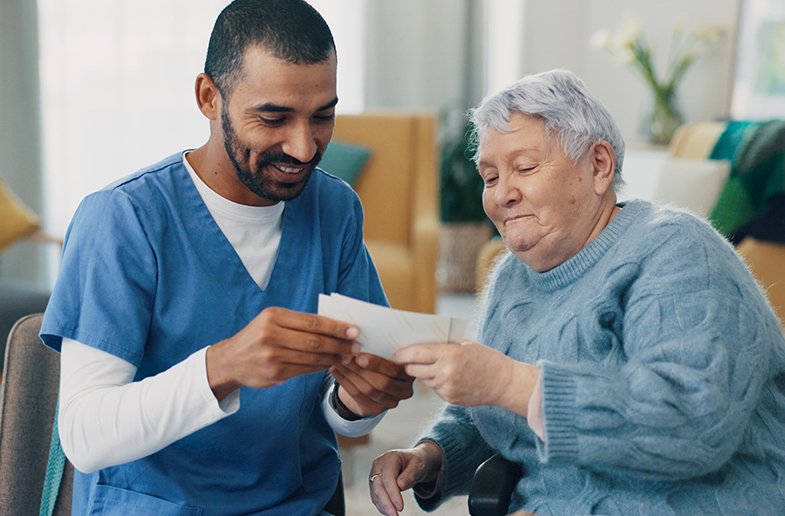 Nurse doing memory care with elderly patient